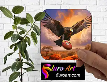 Coaster - Eagle holding a AFL Football